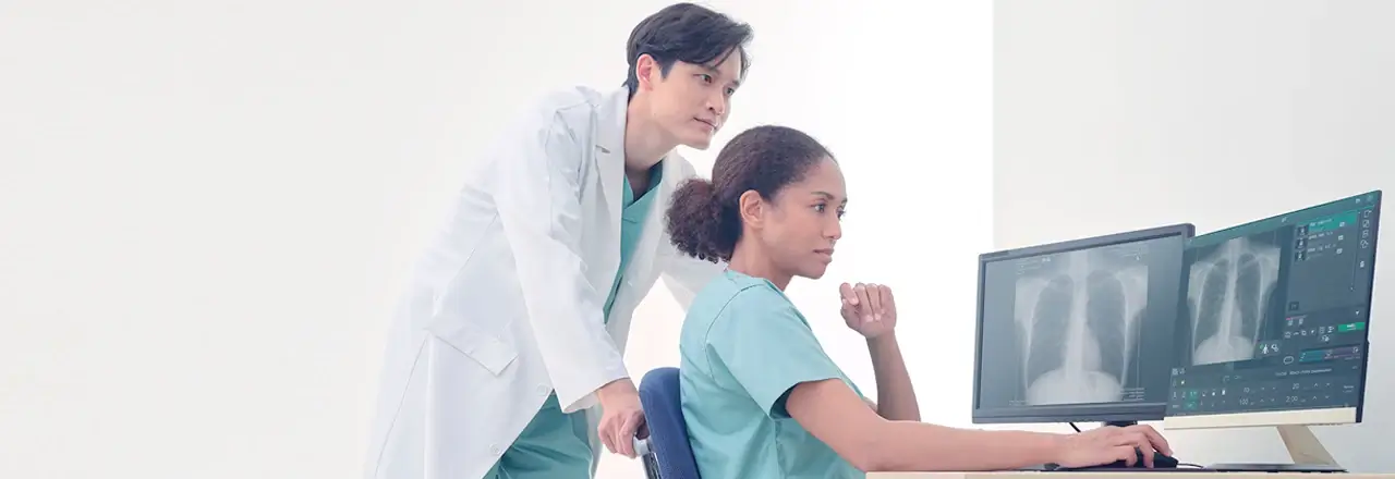 Healthcare specialists reviewing diagnostic images